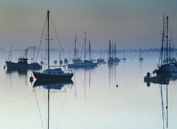 Sailing boats on the tranquil water