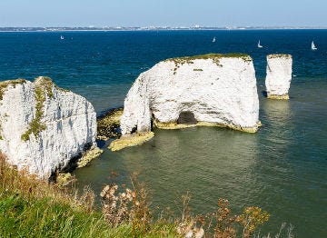 The white Old Harry Rocks of Studland Bay are a must see
