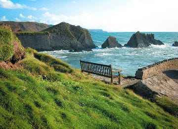 A bench looking over the sea at Hartland in North Devon
