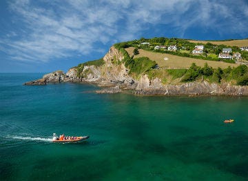 A speed boat of the clear sea waters at Combe Martin 