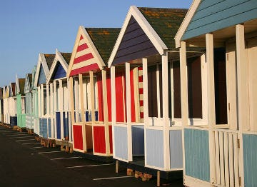The iconic beach huts of Southwold Beach, now available to hire!